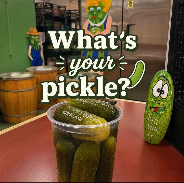 Pickle display with barrels inside New York Pickle stand